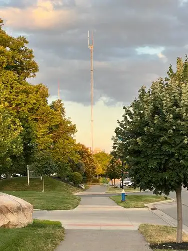 Towering above the golden hour glow.